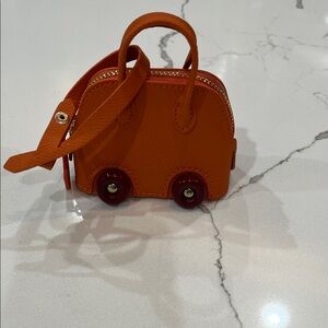 Orange Mini H Handbag with Wheels ear pod case or bag charm